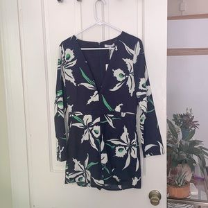 Never worn LucyParis navy floral romper sz M